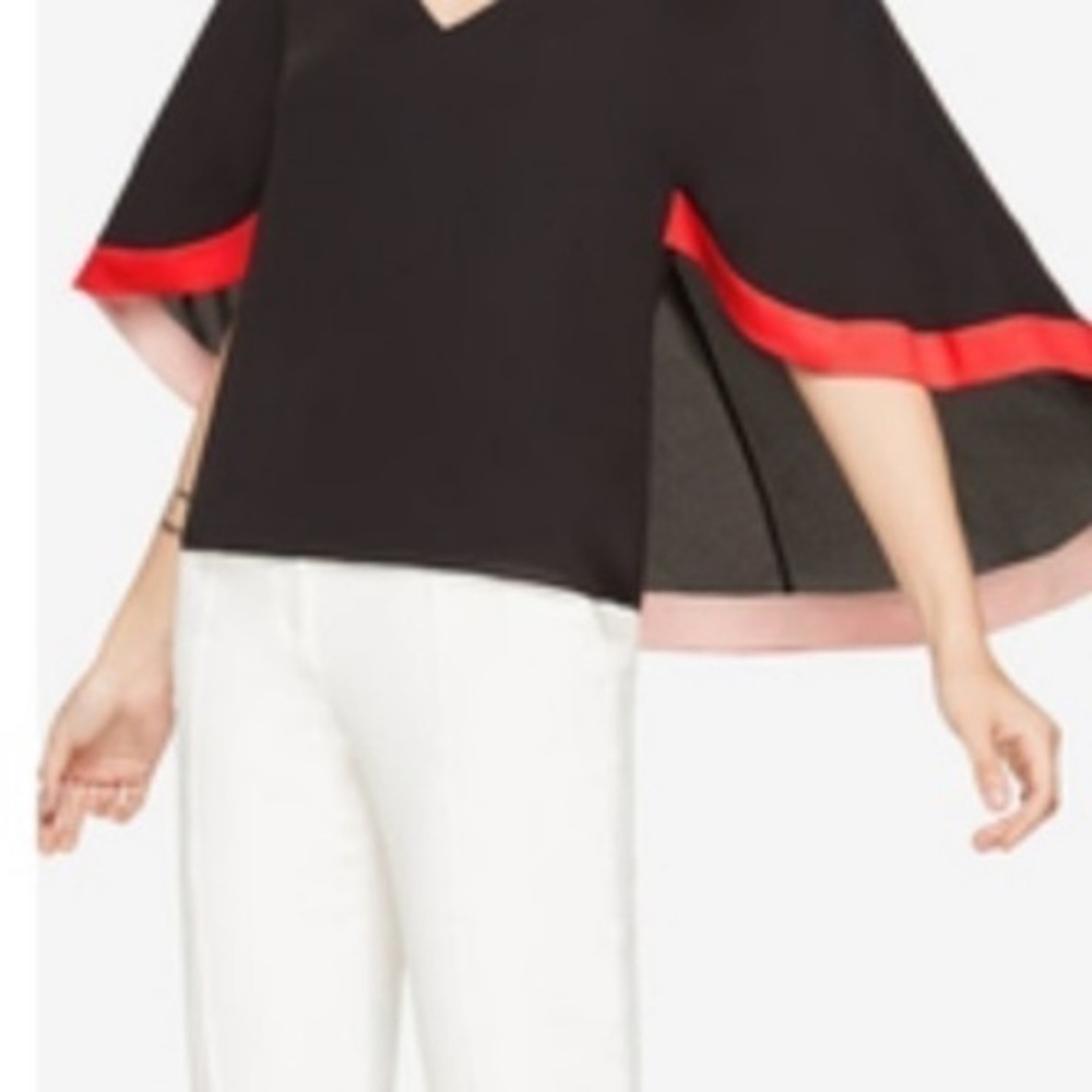 BCBG Cape top S worn 1 time like new 
BCBGMaxAzria
stylish bat wings shirt